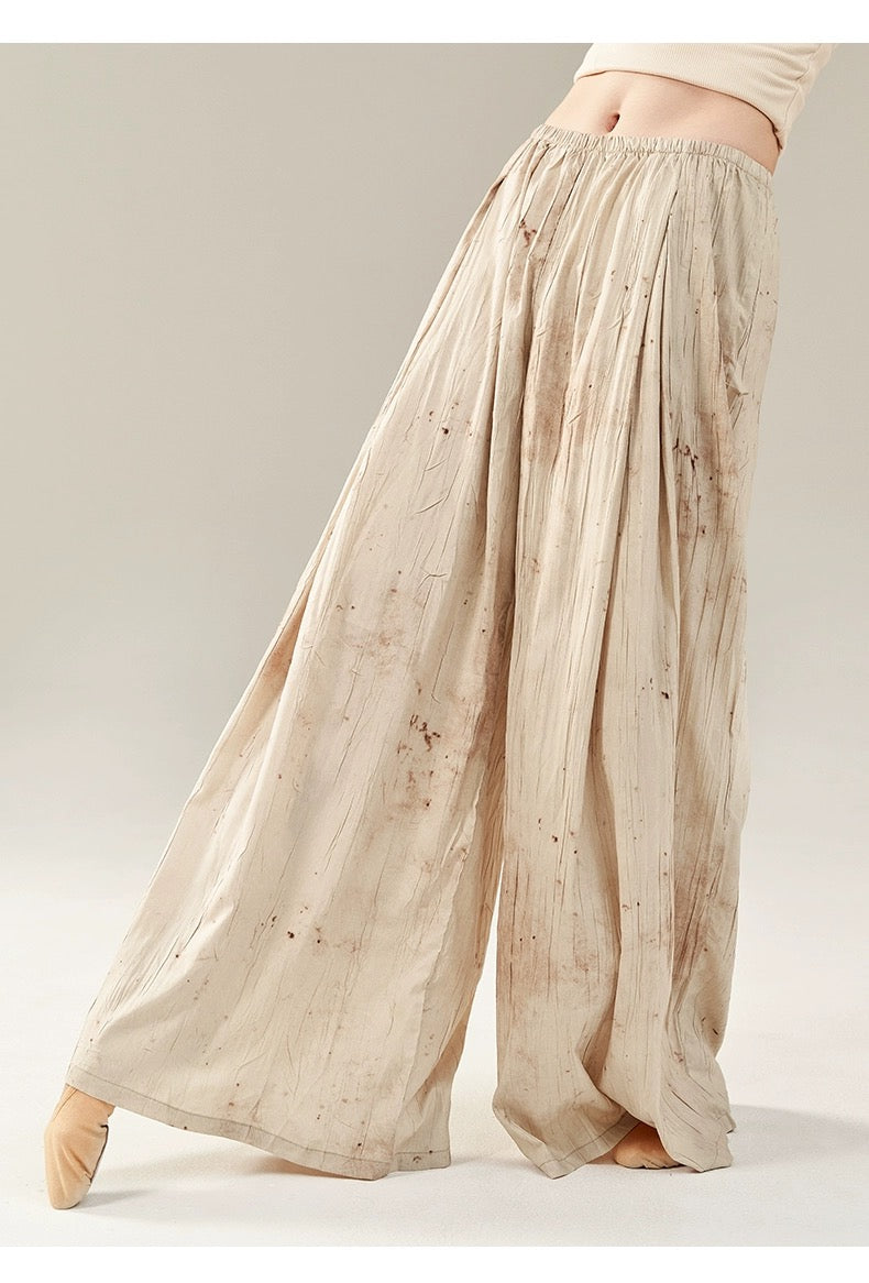 "Apricot-colored trousers, classical dance attire, everyday wear."