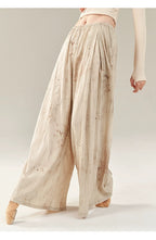 "Apricot-colored trousers, classical dance attire, everyday wear."