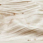 Details of fabric for apricot-colored classical ballet trousers.