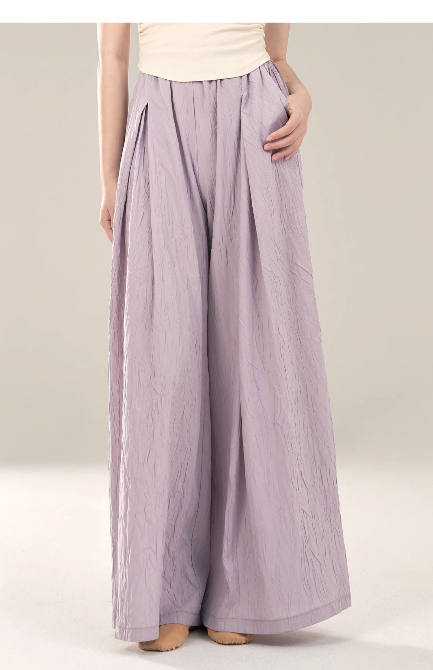 "Light purple loose-fitting trousers, classical dance attire, casual."